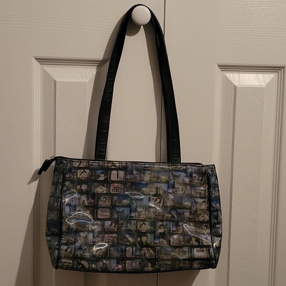 Relic cinema print image shift shoulder bag.